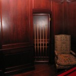 Secret door behind billiard cue rack
