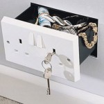 Hidden electrical outlet wall safe