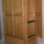 Secret Door on Armoire Reveals Hidden Gun Compartment
