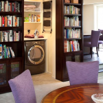 Hidden Bookcase Door Reveals Laundry Room