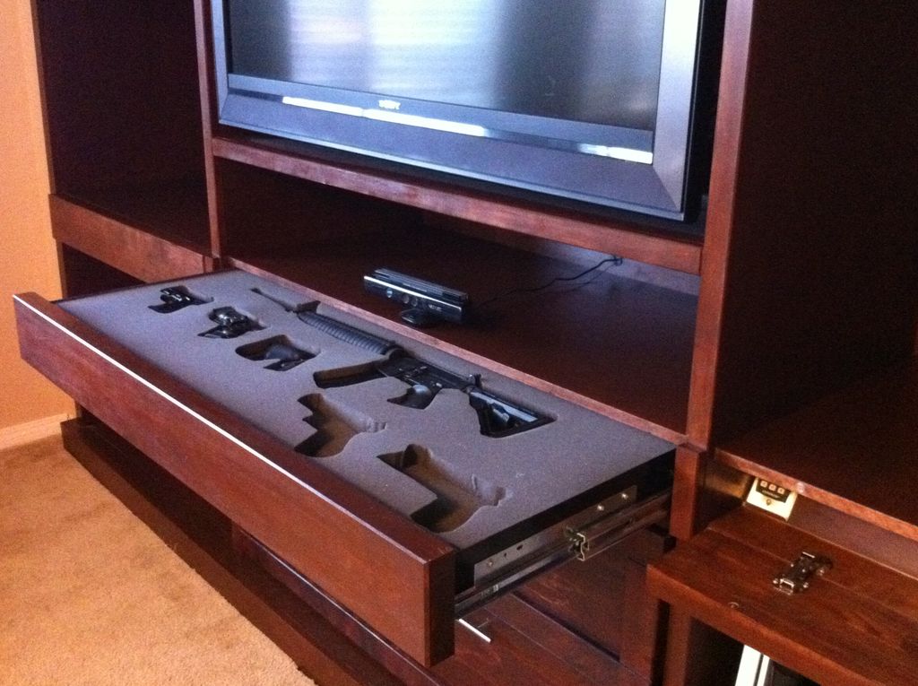 Here is a DIY secret gun safe the user added to his media center 