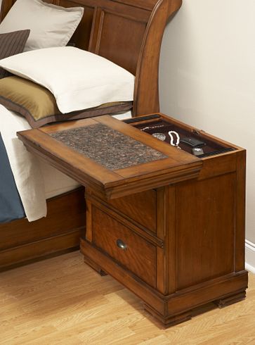 This nightstand has a top that slides forward to reveal a secret 