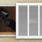 Hidden Gun Compartment Behind Wall Grate