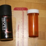 Secret stash can safe made from Axe Body Spray and pill bottle
