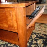 Secret compartment for firearms in furniture