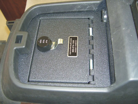 Hidden lockable secure center console vault safe