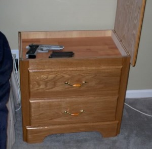 Lift top on nightstand to reveal hidden stash compartment