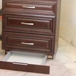 Cabinet with secret compartment drawer in toekick