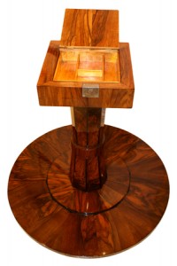 Tilt top table reveals secret compartment in furniture