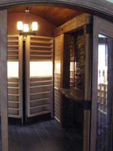Hidden Doors with Shelves Conceal Secret Wine Cellar