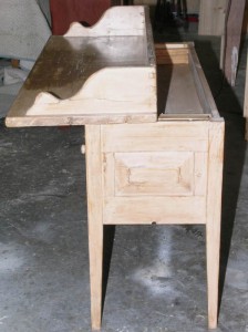 Top slides forward to reveal secret compartment