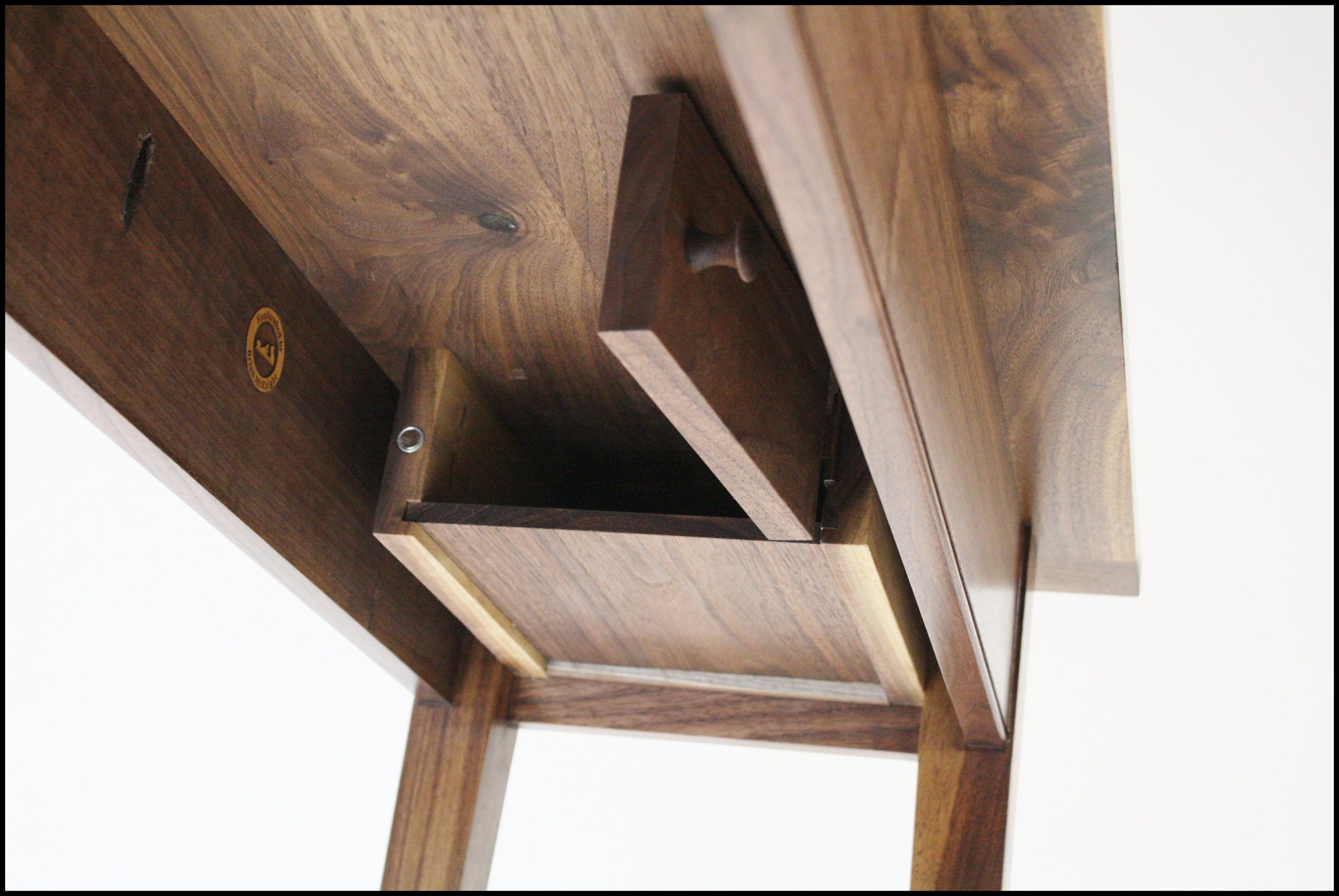 Hidden stash box under console table