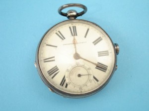Pocket watch with hidden miniature pistol