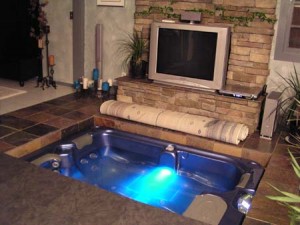 Hot Tub Installed in Floor by Fireplace
