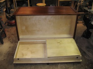 Fold down compartment in custom dresser