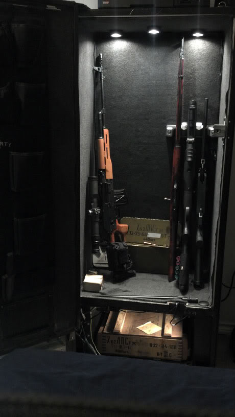 Soda pop machine converted to rifle safe