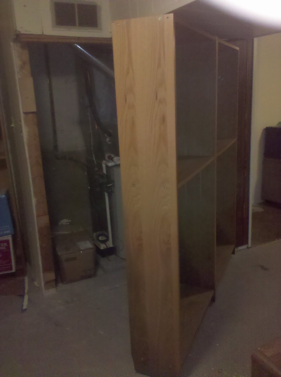 Hidden Closet Behind IKEA Bookcase Doors