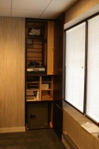 Wall Panel Opens to Closet and Safe