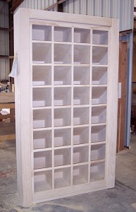 Pigeon Holes Make Up Secret Door