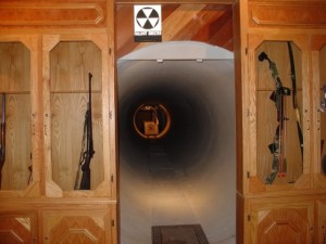 Gun Cabinet Door Reveals Hidden Firing Range