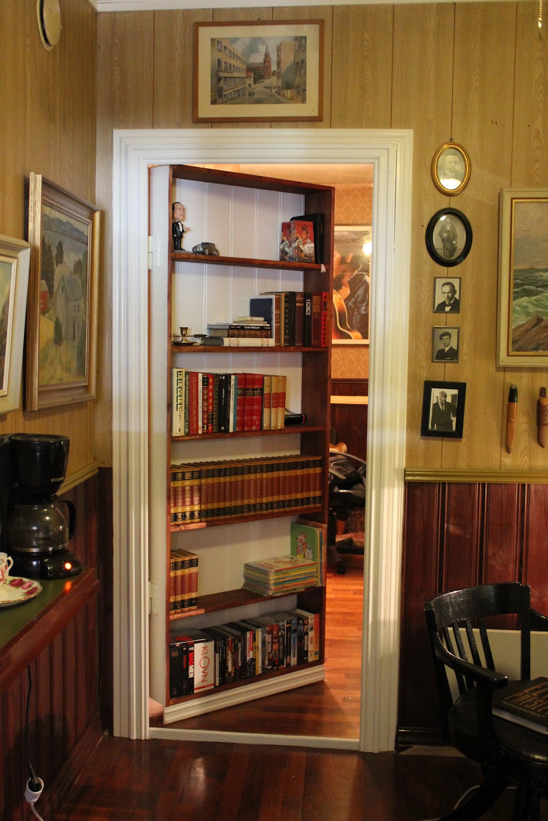 Hidden Room Revealed by Bookshelf Door