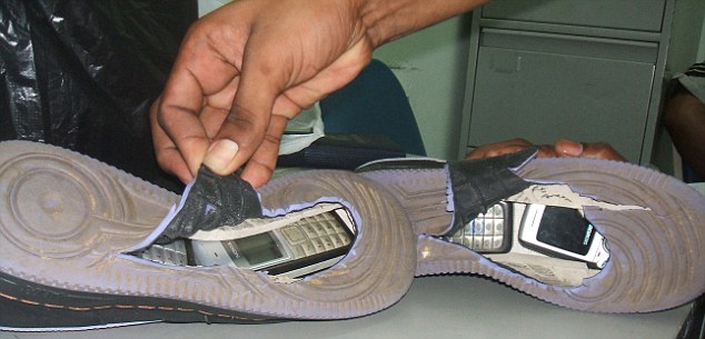 Mobile Phones Stashed in Secret Compartment of Shoe
