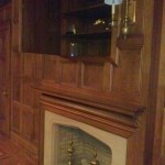 Door Opens To Reveal Secret Cabinet Above Fireplace