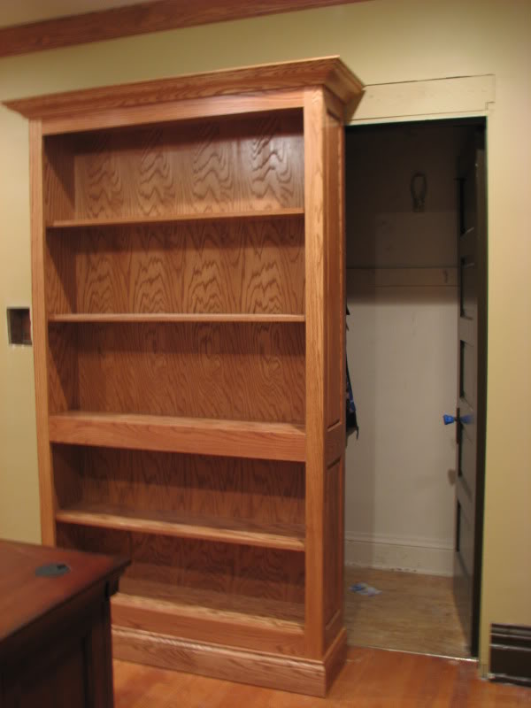 Bookcase Slides to Reveal Hidden Gun Storage