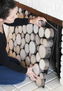Hidden Storage Behind Faux Wood Pile